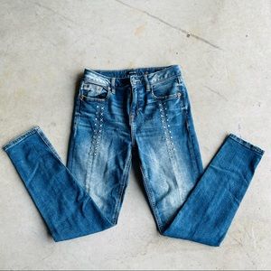 Miss Me Studded + Crossed Skinny Jeans